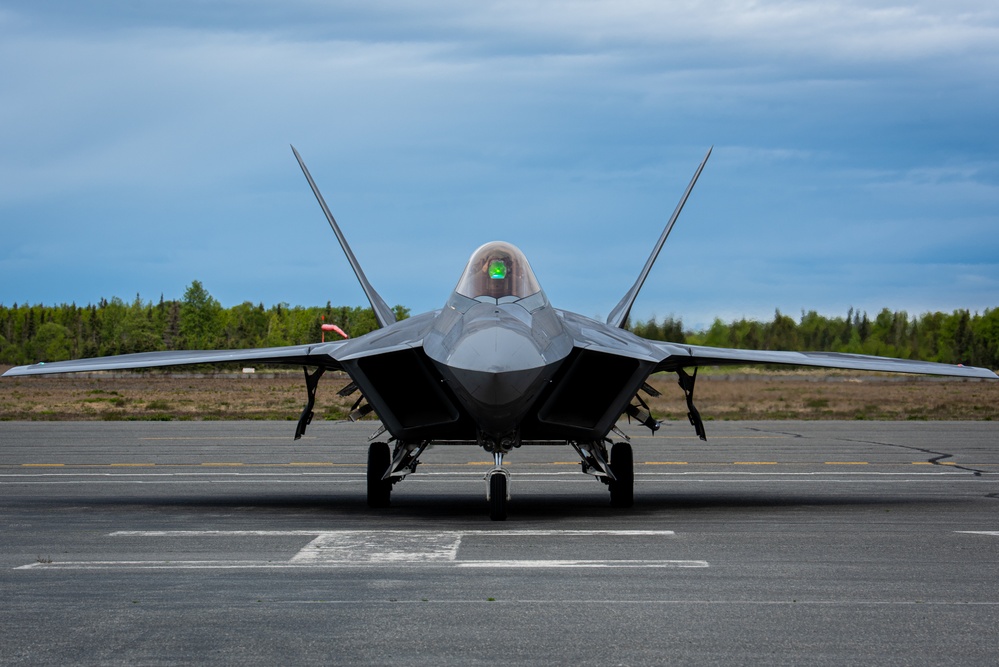 F-22 Raptors assigned to JBER conduct aerial maneuvers during exercise Tropic Tundra