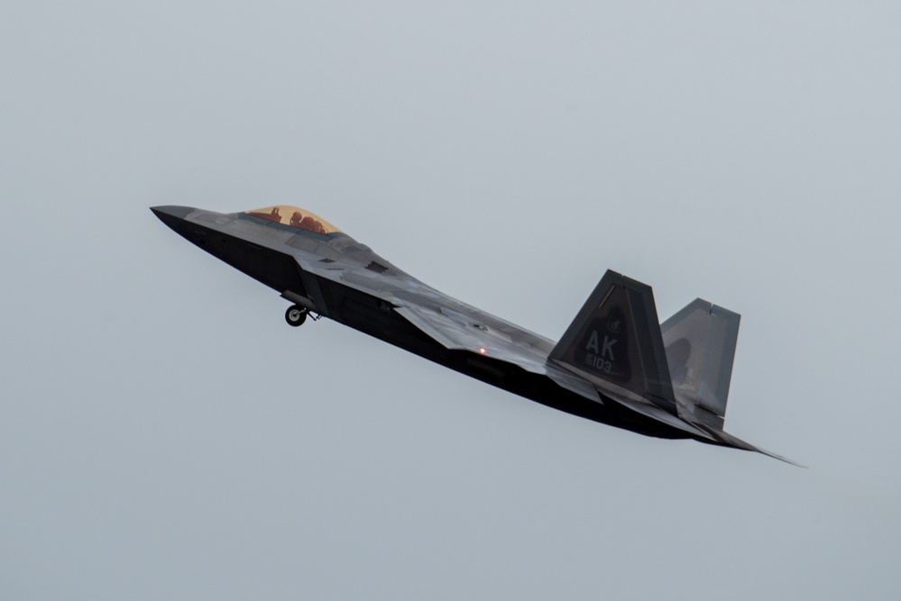 F-22 Raptors assigned to JBER conduct aerial maneuvers during exercise Tropic Tundra