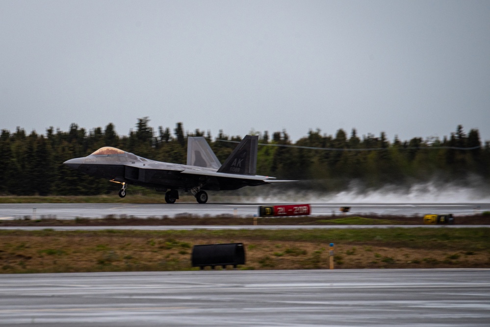 F-22 Raptors assigned to JBER conduct aerial maneuvers during exercise Tropic Tundra