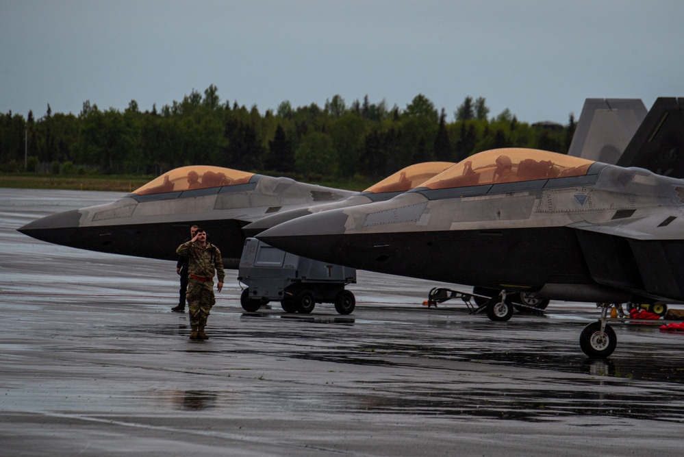 F-22 Raptors assigned to JBER conduct aerial maneuvers during exercise Tropic Tundra