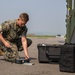 U.S. Marine inspects gear in Osan Air Base