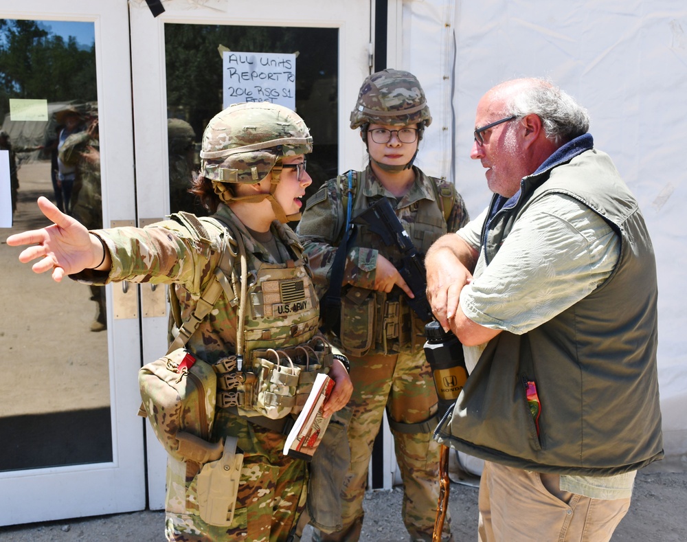 452nd Field Hospital contain demonstrators during Global Medic simulation