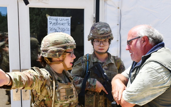 452nd Field Hospital contain demonstrators during Global Medic simulation