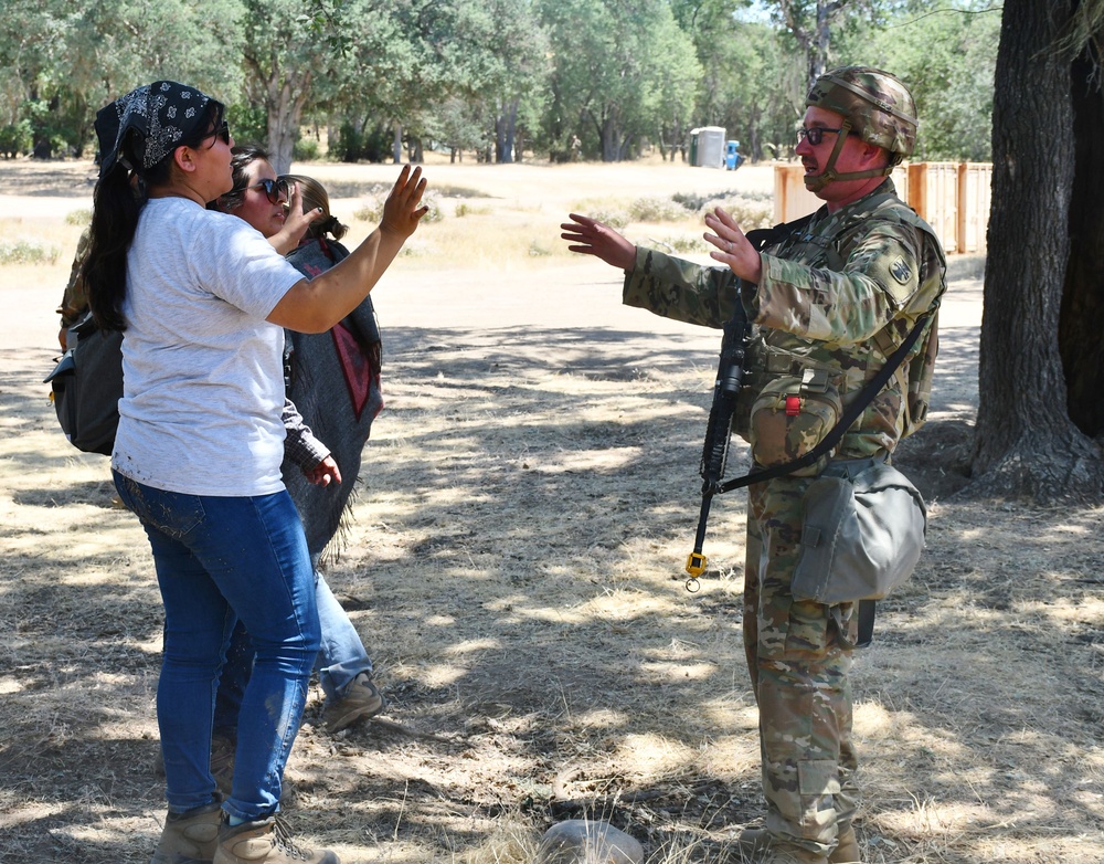 452nd Field Hospital contain demonstrators during Global Medic simulation