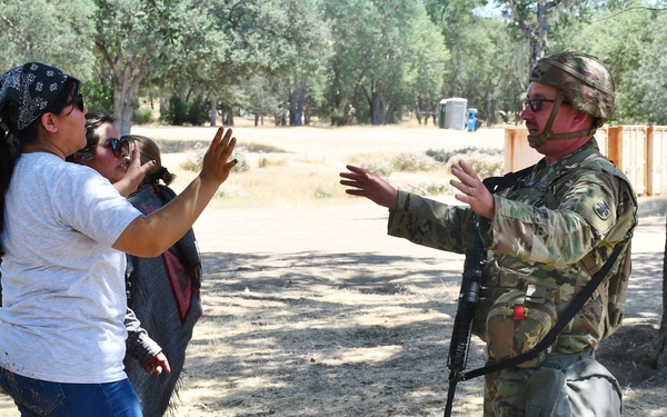 452nd Field Hospital contain demonstrators during Global Medic simulation