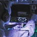U.S. Navy, 909th ARS perform night training over the Pacific