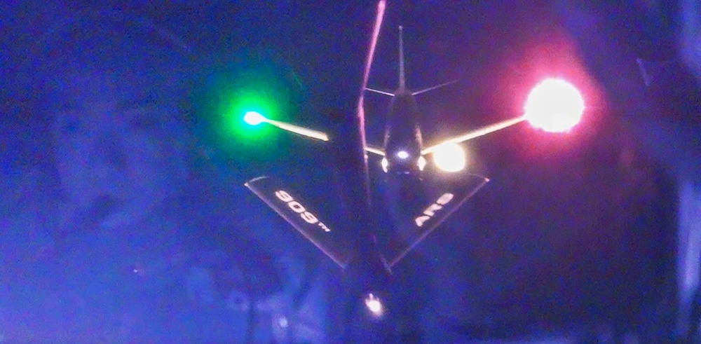 U.S. Navy, 909th ARS perform night training over the Pacific