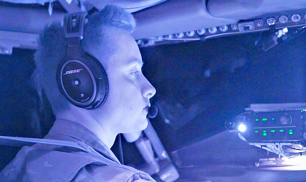 U.S. Navy, 909th ARS perform night training over the Pacific