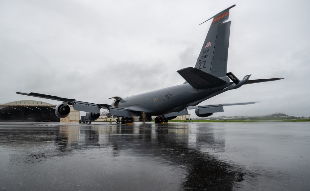 U.S. Navy, 909th ARS perform night training over the Pacific