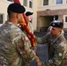838th Transportation BN Senior Enlisted Leader Hands the Unit Colors to Outgoing 838th Transportation BN Commander