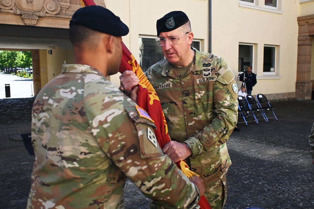 Outgoing 838th Transportation BN Commander Hands the Unit Colors to 598th Transportation BDE Commander