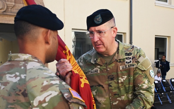 Outgoing 838th Transportation BN Commander Hands the Unit Colors to 598th Transportation BDE Commander