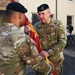 Outgoing 838th Transportation BN Commander Hands the Unit Colors to 598th Transportation BDE Commander
