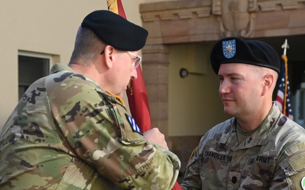 598th Transportation BDE Commander Hands the Unit Colors to Incoming 838th Transportation BN Commander
