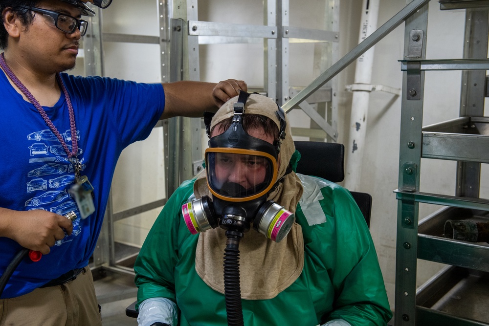 Puget Sound Naval Shipyard (PSNS) workers conduct ship maintenance onboard USS Ronald Reagan (CVN 76).