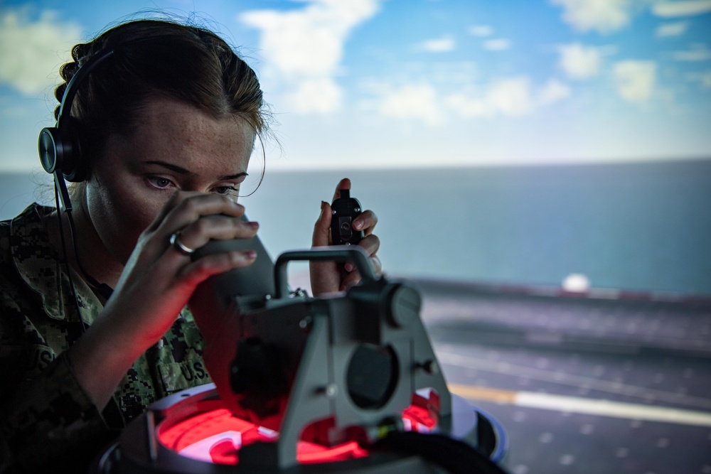 USS Ronald Reagan (CVN76) Sailors participate in a Navigation Simulation