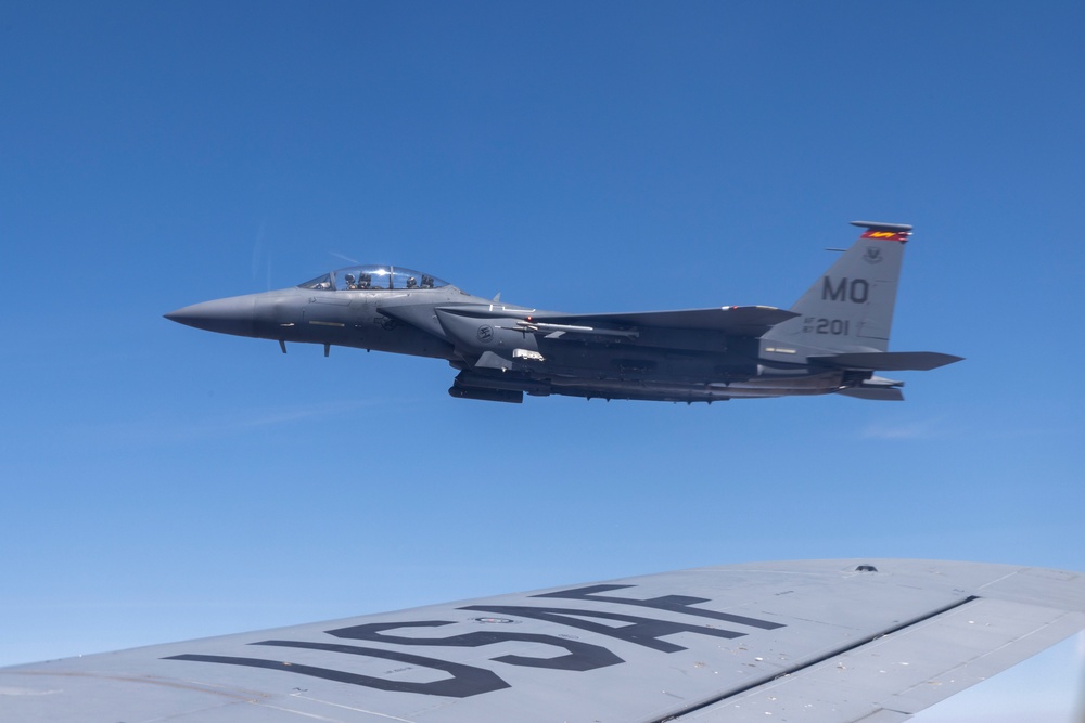 KC-135 Stratotanker refuels F-15E Strike Eagle