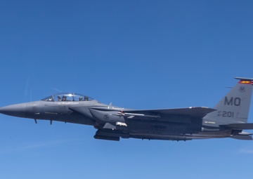 KC-135 Stratotanker refuels F-15E Strike Eagle