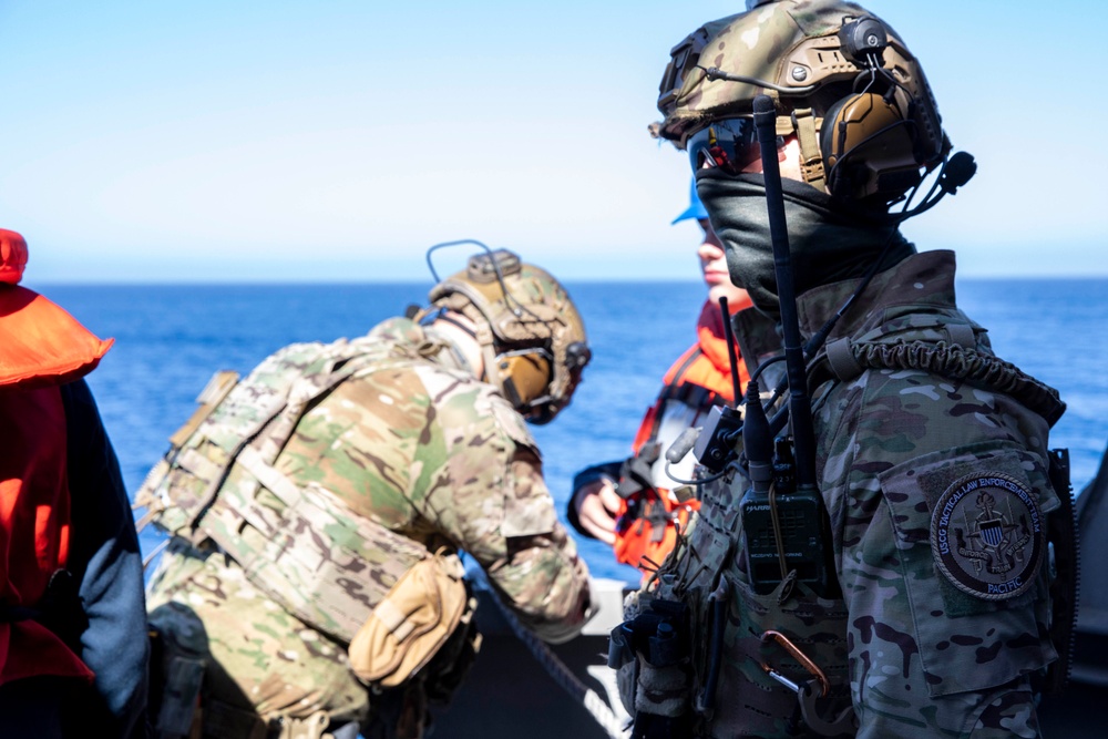 USS Charleston (LCS-18) conducts small boat operations with U.S. Coast Guard