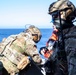 USS Charleston (LCS-18) conducts small boat operations with U.S. Coast Guard