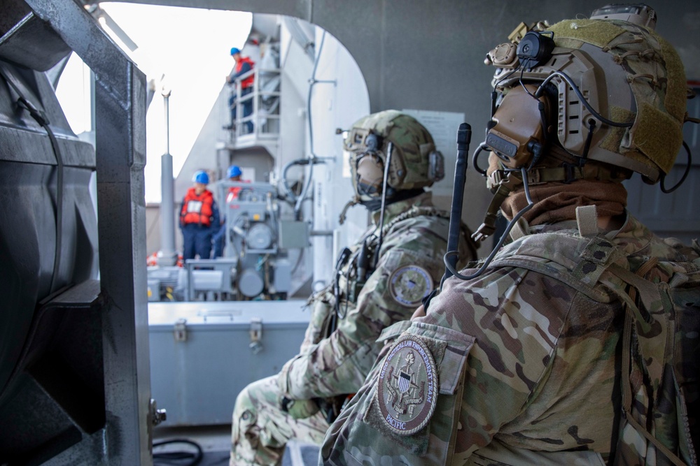 USS Charleston (LCS-18) conducts small boat operations with U.S. Coast Guard