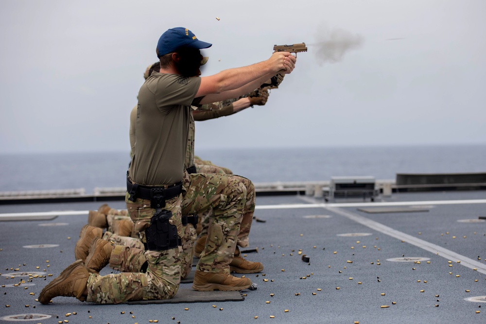 U.S. Coast Guard Law Enforcement Detachment conducts small-arms live fire exercise with U.S. Navy Sailors on the USS Charleston