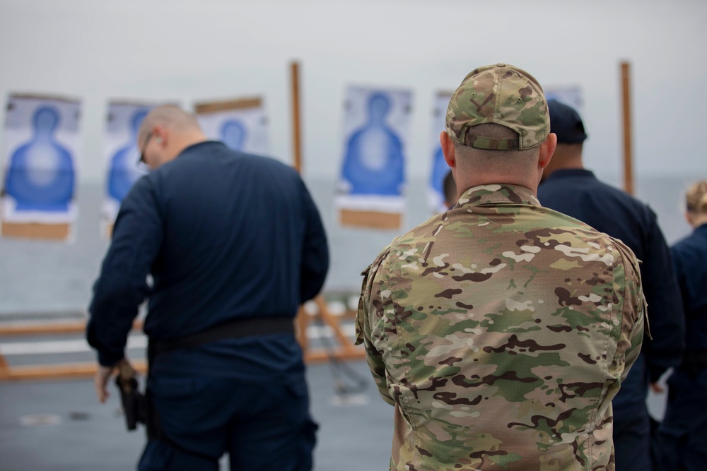 U.S. Coast Guard Law Enforcement Detachment conducts small-arms live fire exercise with U.S. Navy Sailors on the USS Charleston