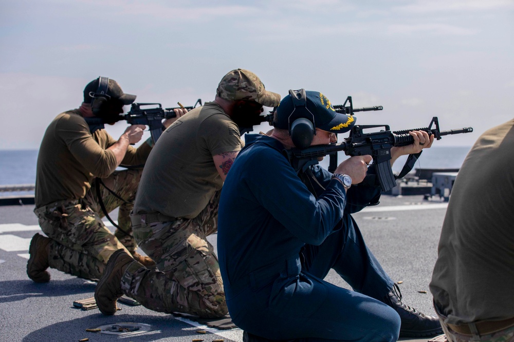 U.S. Coast Guard Law Enforcement Detachment conducts small-arms live fire exercise with U.S. Navy Sailors on the USS Charleston
