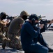 U.S. Coast Guard Law Enforcement Detachment conducts small-arms live fire exercise with U.S. Navy Sailors on the USS Charleston