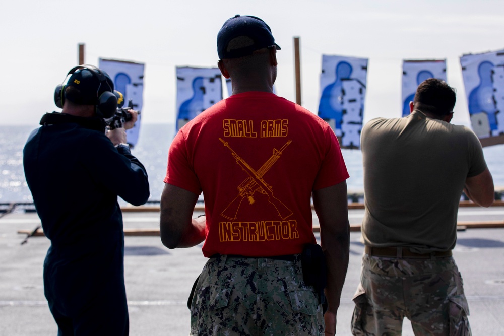 U.S. Coast Guard Law Enforcement Detachment conducts small-arms live fire exercise with U.S. Navy Sailors on the USS Charleston