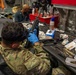 A U.S. Coast Guard Law Enforcement Detachment conducts weapons maintenance with U.S. Navy Sailors onboard the USS Charleston
