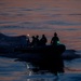USS Charleston (LCS-18) conducts small boat operations with U.S. Coast Guard