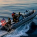 USS Charleston (LCS-18) conducts small boat operations with U.S. Coast Guard
