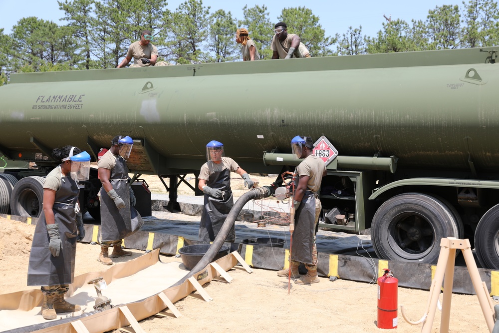 233rd Quartermaster Company Fuel System Supply Point receives fuel from the 223rd Transportation Company at QLLEX