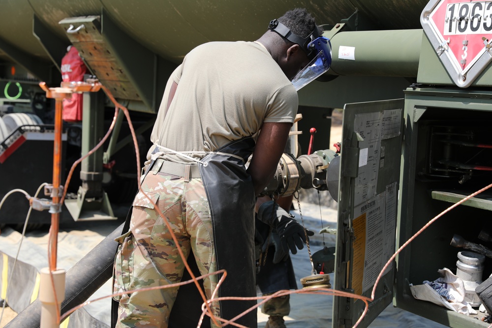 233rd Quartermaster Company Fuel System Supply Point receives fuel from the 223rd Transportation Company at QLLEX