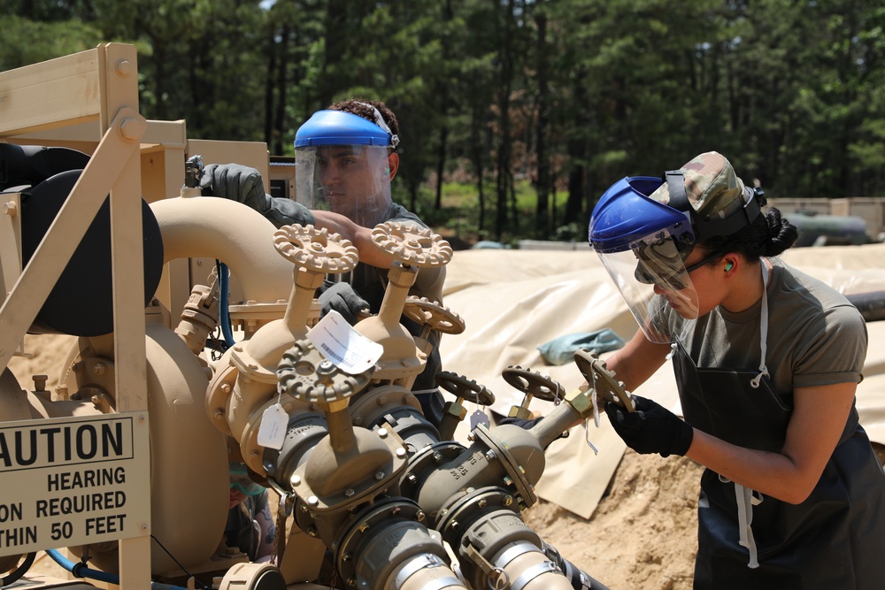 233rd Quartermaster Company Fuel System Supply Point receives fuel from the 223rd Transportation Company at QLLEX