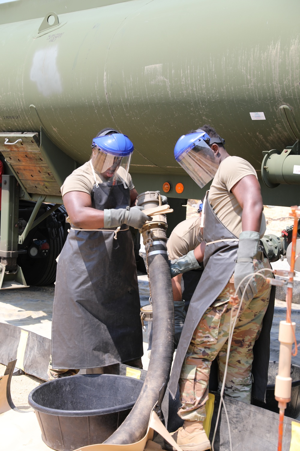 233rd Quartermaster Company Fuel System Supply Point receives fuel from the 223rd Transportation Company at QLLEX