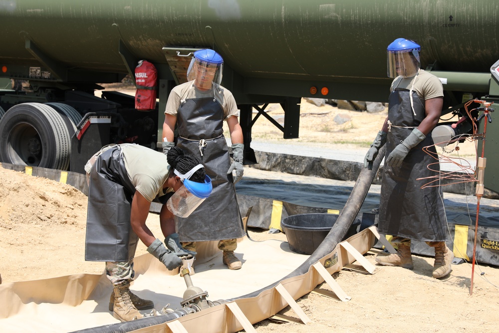 233rd Quartermaster Company Fuel System Supply Point receives fuel from the 223rd Transportation Company at QLLEX
