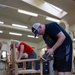 Services Airmen Refurbish MWR Furniture