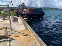 Responders address waste oil spill from freight vessel Mariana in Tinian Harbor