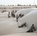 380th Community Unites to Install Fuel Bladders
