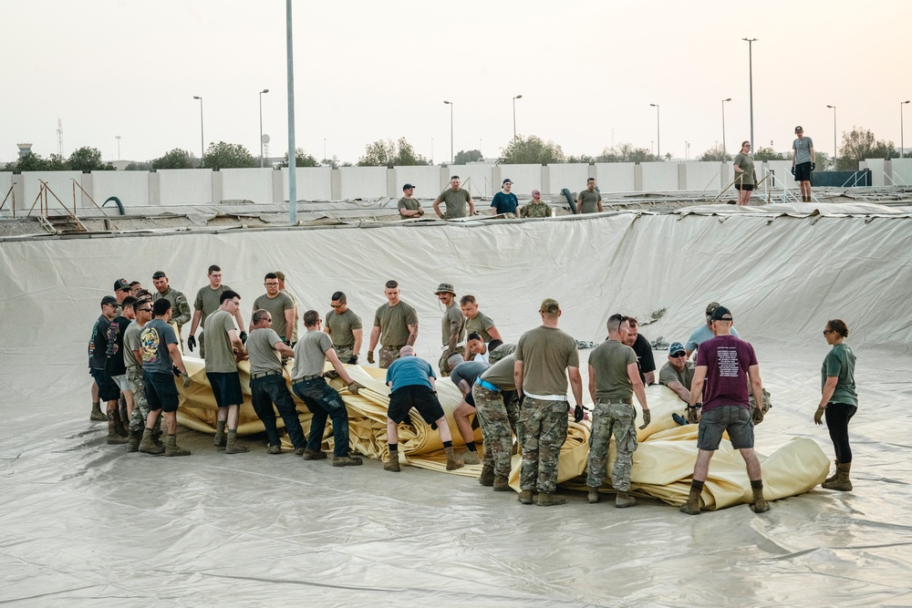 380th Community Unites to Install Fuel Bladders