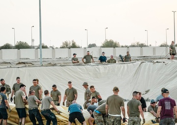 380th Community Unites to Install Fuel Bladders