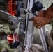 Securing the Runway: Heavy Equipment Operators Remove Bolts in Critical Overhaul