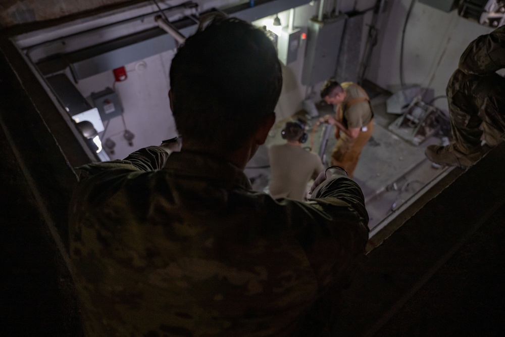 Securing the Runway: Heavy Equipment Operators Remove Bolts in Critical Overhaul