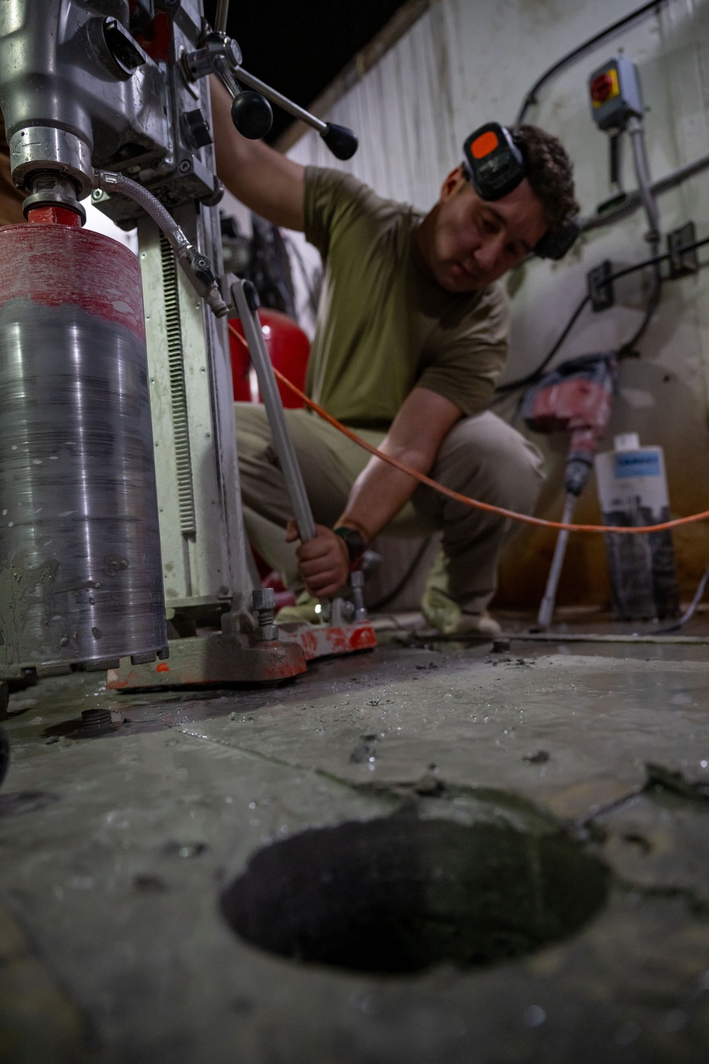Securing the Runway: Heavy Equipment Operators Remove Bolts in Critical Overhaul