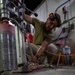 Securing the Runway: Heavy Equipment Operators Remove Bolts in Critical Overhaul