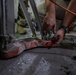 Securing the Runway: Heavy Equipment Operators Remove Bolts in Critical Overhaul