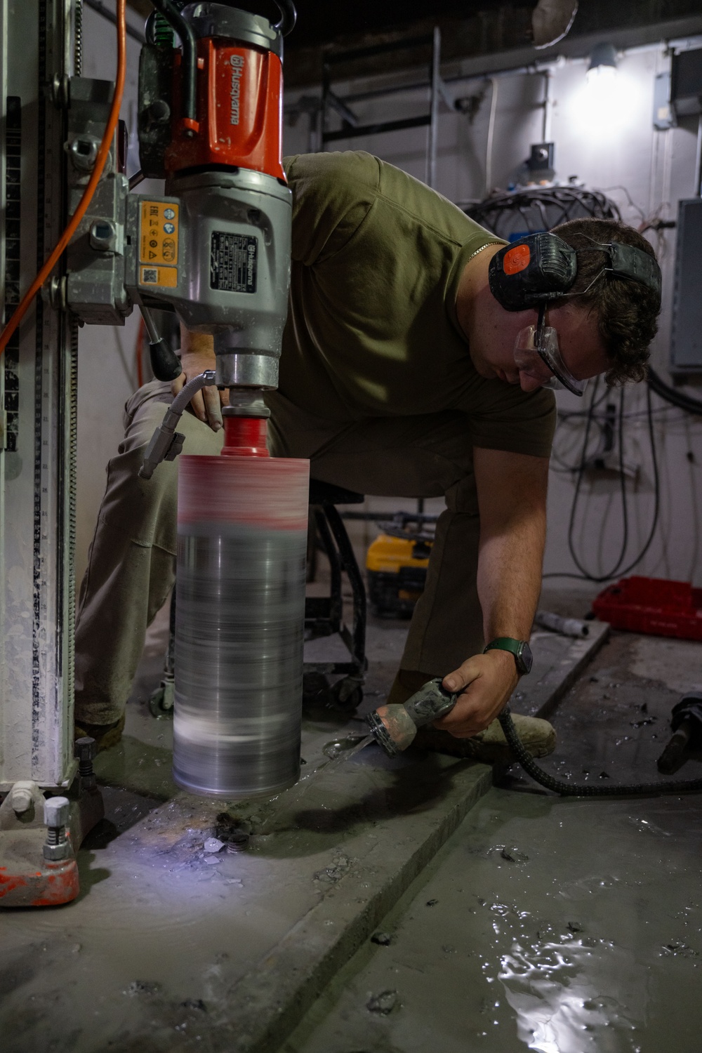 Securing the Runway: Heavy Equipment Operators Remove Bolts in Critical Overhaul