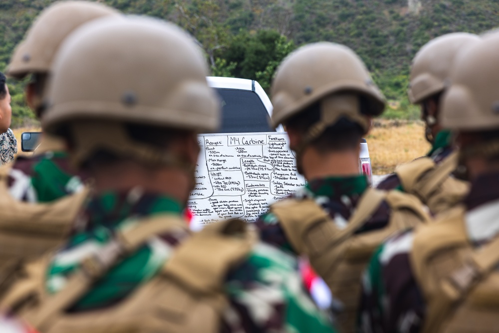 U.S. Marines teach members of Indonesian Korps Marinir about M4 carbine
